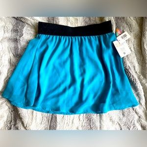 Bright and whimsical LuLaroe Lola skirt HEMMED because SLAY